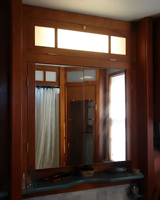Custom Lavatory Mirror Cabinet made of African Opepe wood